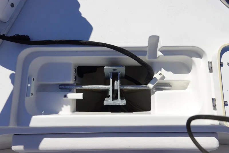 Slide: The Image of Anchor storage compartment on a 2021 Sea Hunt Ultra 234 boat. - 35