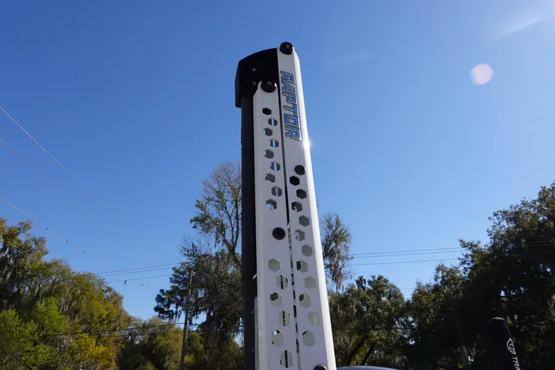 Slide: The Image of Sea Hunt Ultra 234 boat with Raptor anchor pole against clear blue sky, 2021 model. - 7