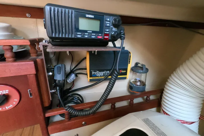 Slide: The Image of Interior of 1980 Catalina 30 sailboat with radio and ProSport12 charger. - 15