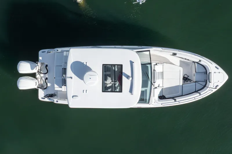 Slide: The Image of Aerial view of 2020 Chaparral 300 OSX boat on calm water. - 5