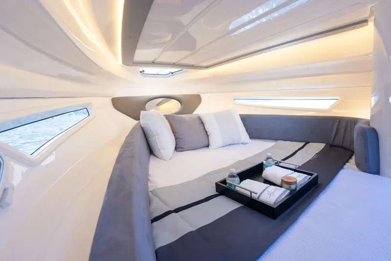Slide: The Image of Luxurious interior of 2026 Hanover 305 yacht with cozy bed and elegant decor. - 17
