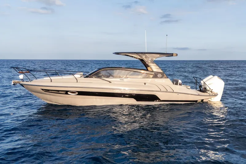 Slide: The Image of Luxury Hanover 305 yacht cruising on open sea, 2026 model. - 4