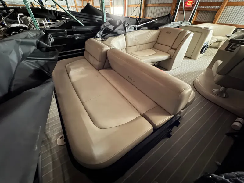 Slide: The Image of Interior of a 2018 Harris 240 Solstice pontoon boat with beige leather seating. - 21
