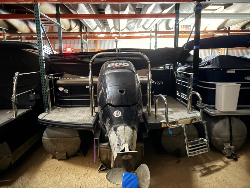 Slide: The Image of 2018 Harris 240 Solstice pontoon boat in warehouse. - 27
