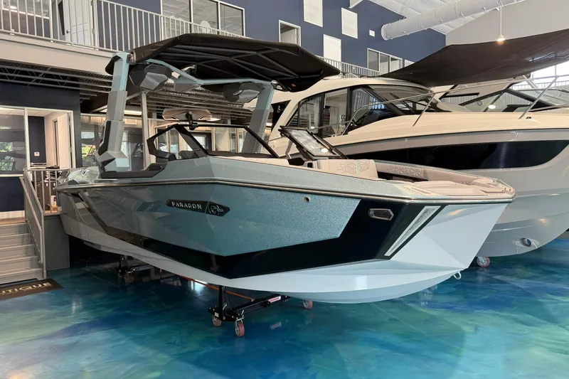 The Image of 2026 Nautique Super Air Nautique G25 Paragon displayed in a showroom. - 0