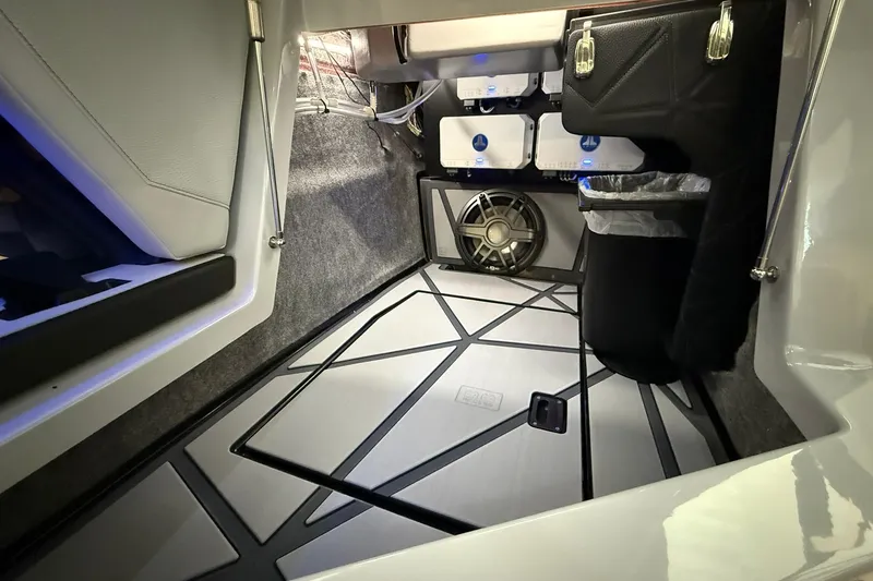 Slide: The Image of Interior of 2026 Nautique Super Air Nautique G25 Paragon, featuring advanced audio system. - 14