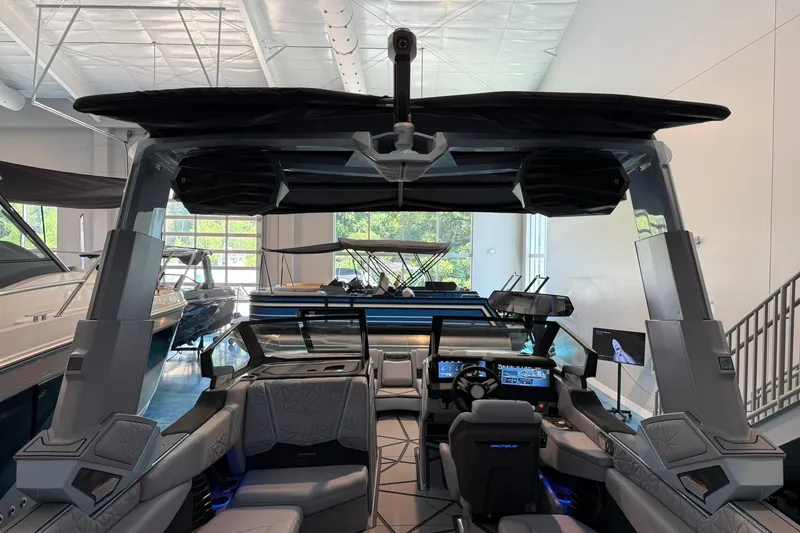 Slide: The Image of 2026 Nautique Super Air Nautique G25 Paragon interior with advanced dashboard and seating. - 25
