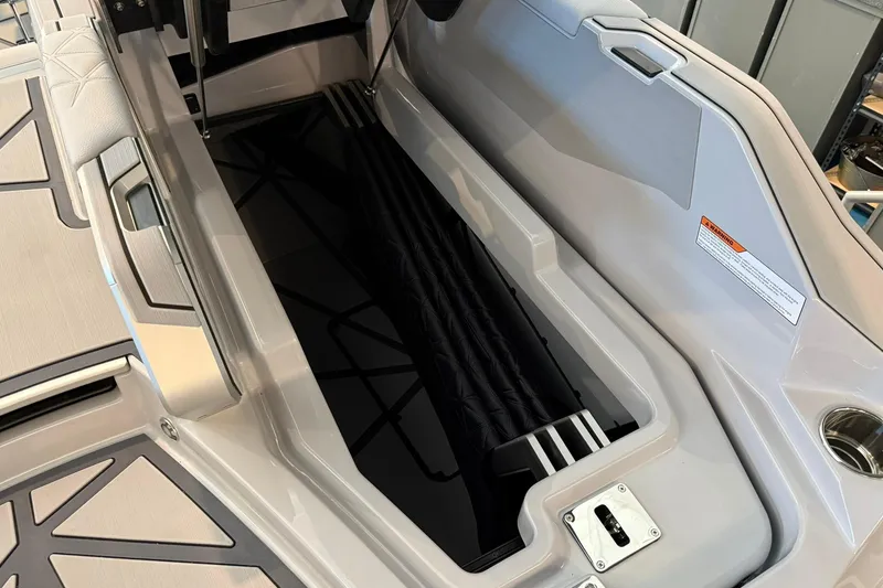 Slide: The Image of 2026 Nautique Super Air Nautique G25 Paragon storage compartment, showcasing sleek design and functionality. - 29