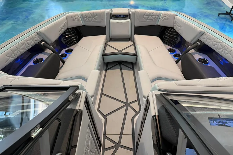 Slide: The Image of Luxurious interior of 2026 Nautique Super Air Nautique G25 Paragon boat with plush seating. - 6
