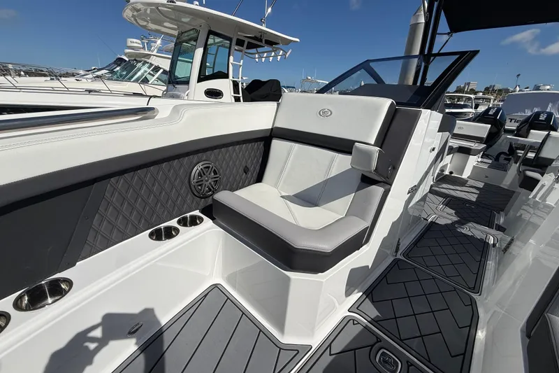 Slide: The Image of 2024 Cobalt R8 Outboard boat interior with luxurious seating and modern design. - 19