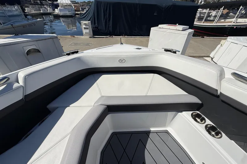 Slide: The Image of 2024 Cobalt R8 Outboard boat interior with sleek seating and cup holders. - 20