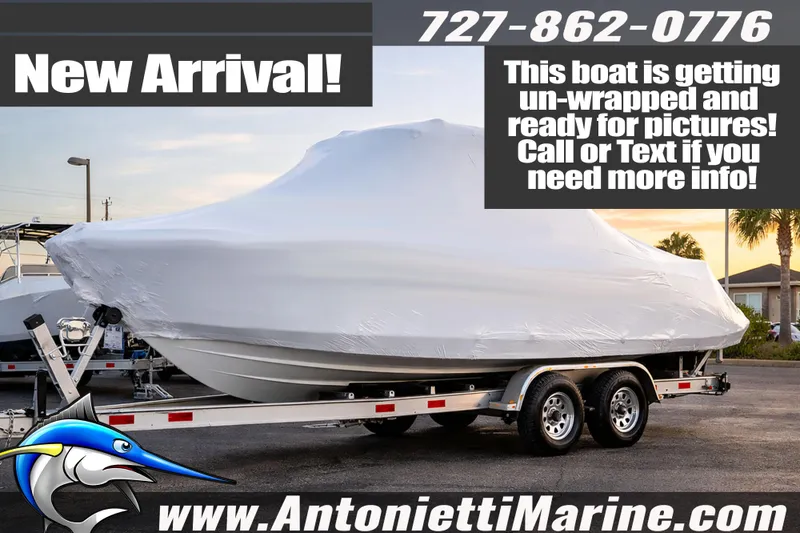 The Image of New 2026 Bentley Pontoons Legacy 243 Swingback EXT, covered, on trailer at Antonietti Marine. - 1