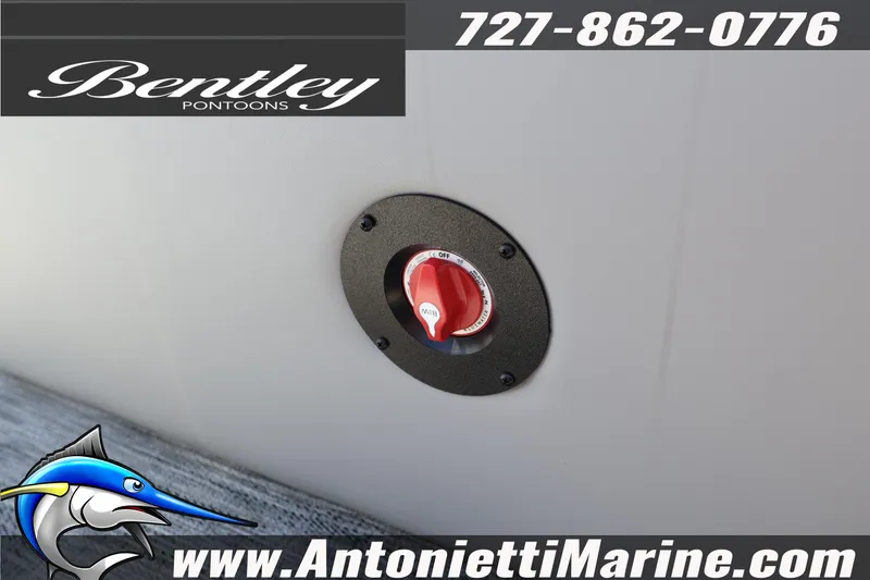 Slide: The Image of 2026 Bentley Pontoons Legacy 243 Swingback EXT battery switch detail with contact information. - 11