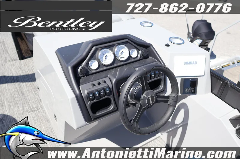 Slide: The Image of 2026 Bentley Pontoons Legacy 243 Swingback EXT dashboard with steering wheel and controls. - 21