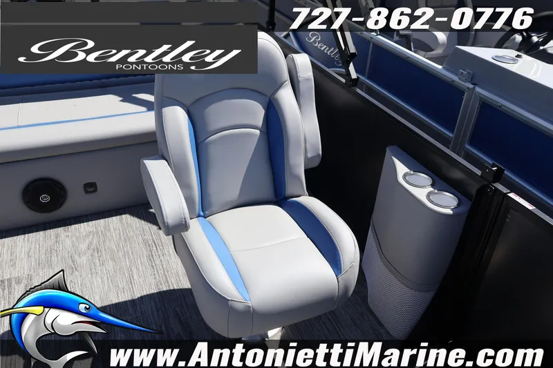 Slide: The Image of 2026 Bentley Pontoons Legacy 243 Swingback EXT interior with plush seating and cup holders. - 27