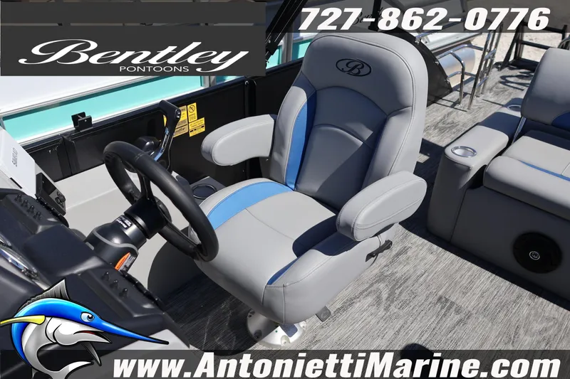 Slide: The Image of 2026 Bentley Pontoons Legacy 243 Swingback EXT captain's chair and helm detail. - 28