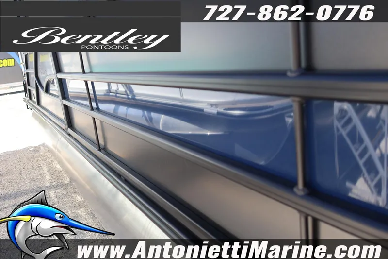 Slide: The Image of 2026 Bentley Pontoons Legacy 243 Swingback EXT, side view, Antonietti Marine branding. - 4