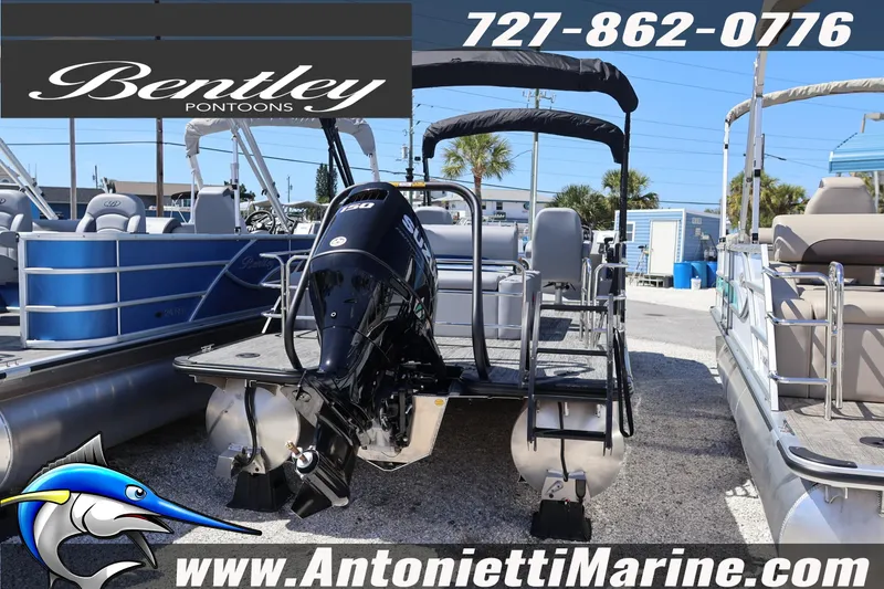 Slide: The Image of 2026 Bentley Pontoons Legacy 243 Swingback EXT displayed at Antonietti Marine dealership. - 6
