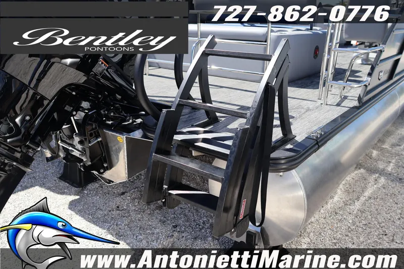 Slide: The Image of 2026 Bentley Pontoons Legacy 243 Swingback EXT with ladder and motor, displayed at Antonietti Marine. - 7