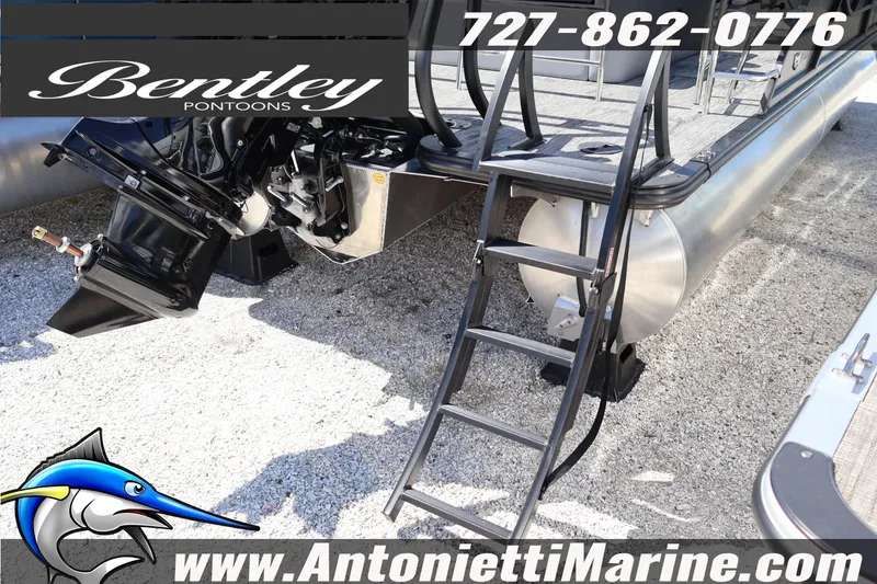 Slide: The Image of 2026 Bentley Pontoons Legacy 243 Swingback EXT with ladder and motor, displayed at Antonietti Marine. - 8