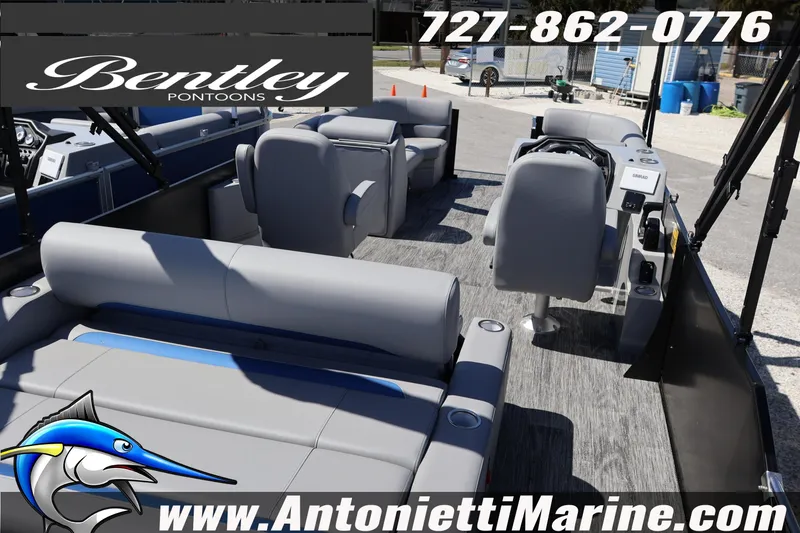 Slide: The Image of 2026 Bentley Pontoons Legacy 243 Swingback EXT interior with gray seating, showcased by Antonietti Marine. - 9