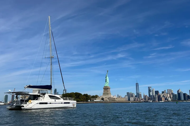 Slide: The Image of Leopard 48 yacht near Statue of Liberty with New York City skyline, 2013 model. - 4