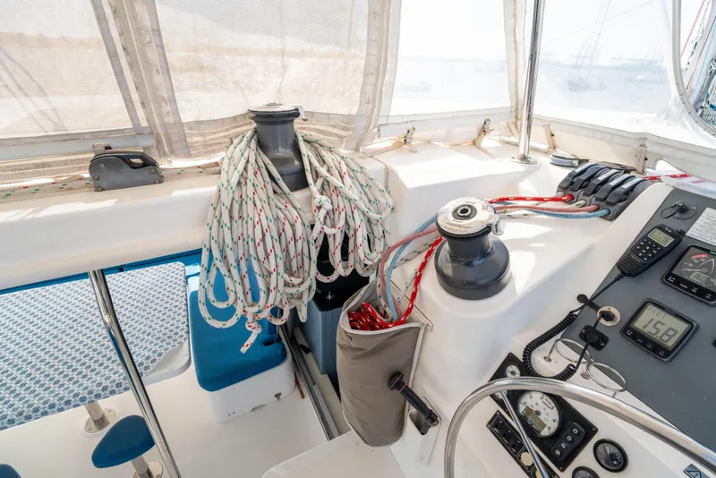 Slide: The Image of Cockpit of 2013 Leopard 48 yacht with ropes and navigation instruments. - 40