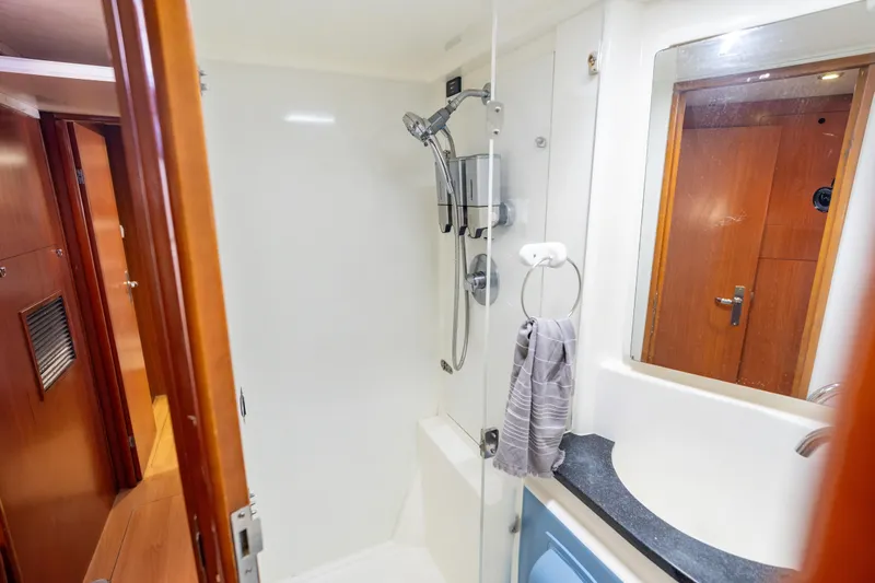 Slide: The Image of Bathroom interior of 2013 Leopard 48 yacht with shower and sink. - 64