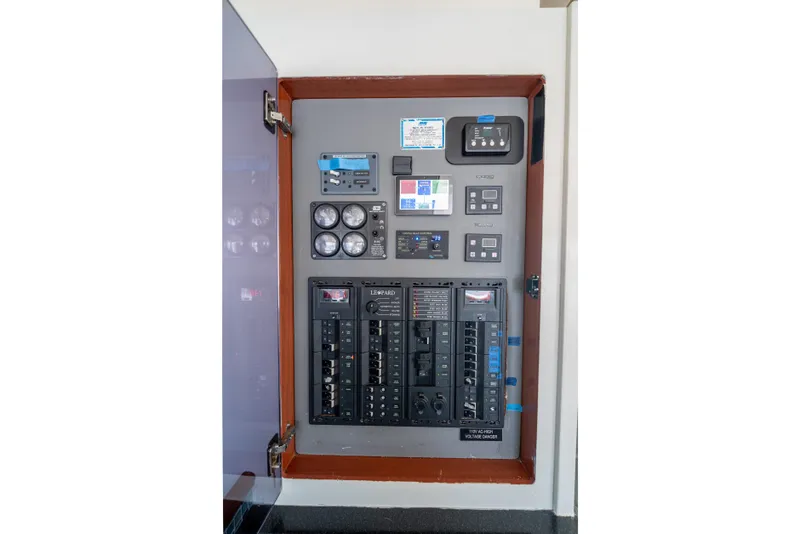 Slide: The Image of Electrical control panel on a 2013 Leopard 48 yacht. - 70