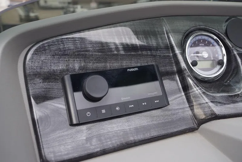 Slide: The Image of Dashboard of 2026 Avalon Catalina boat with Fusion audio system and RPM gauge. - 15