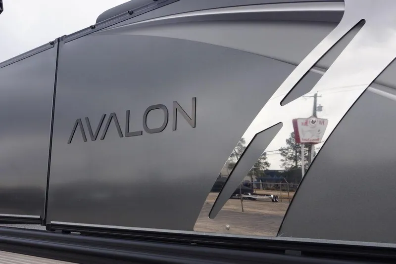 Slide: The Image of 2026 Avalon Catalina Versatile Rear Bench boat, sleek design with metallic finish. - 7