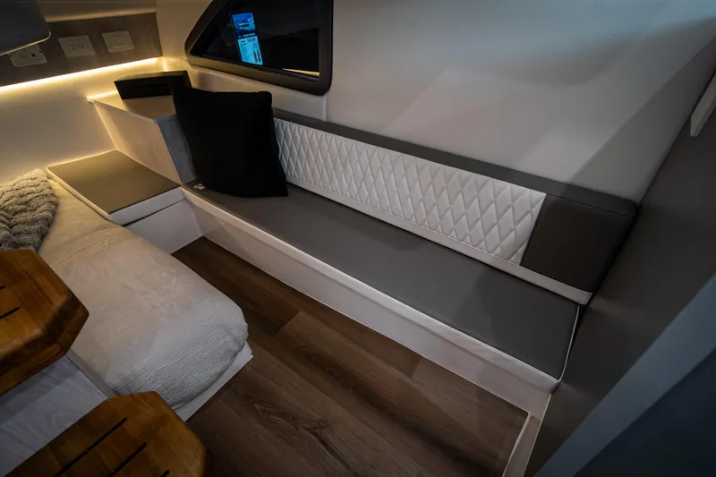 Slide: The Image of Modern interior of Hanover 347, 2026 model, featuring sleek seating and ambient lighting. - 18