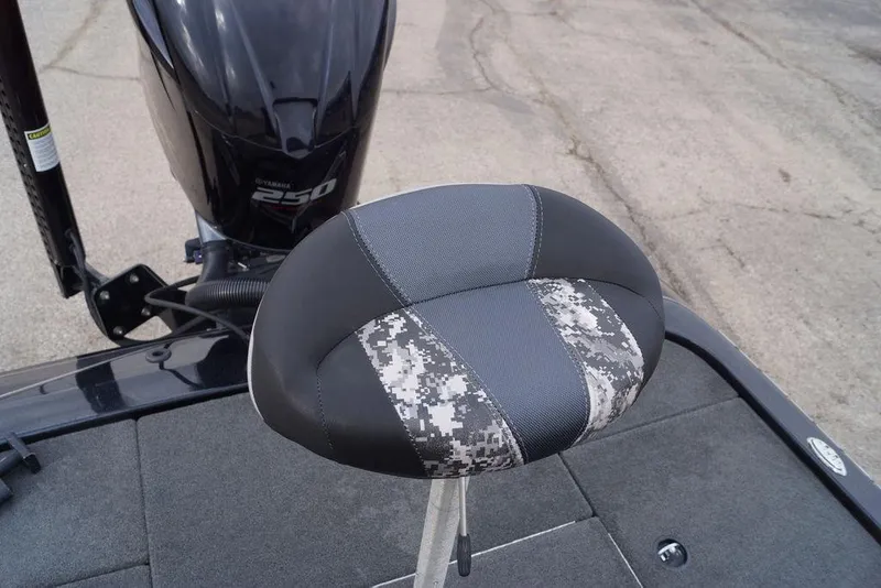Slide: The Image of 2019 Skeeter ZX250 boat seat with digital camo pattern and Yamaha 250 engine. - 5