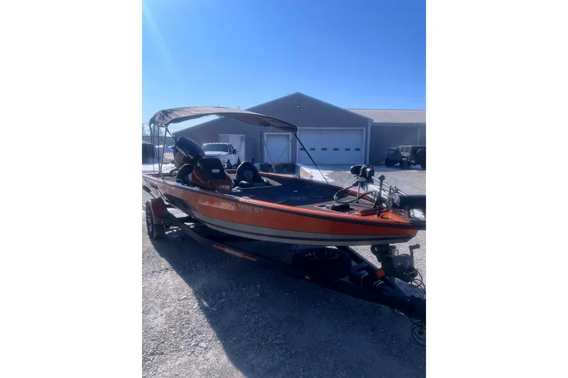 Slide: The Image of 2019 Vexus AVX1880 boat on trailer in front of garage. - 4