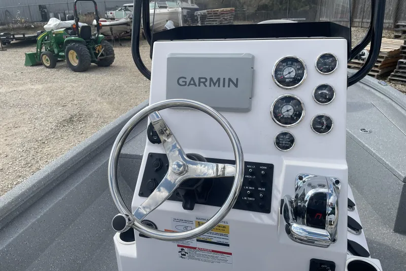 Slide: The Image of Steering console of 2025 Vexus ACX2000 boat with Garmin navigation system. - 8