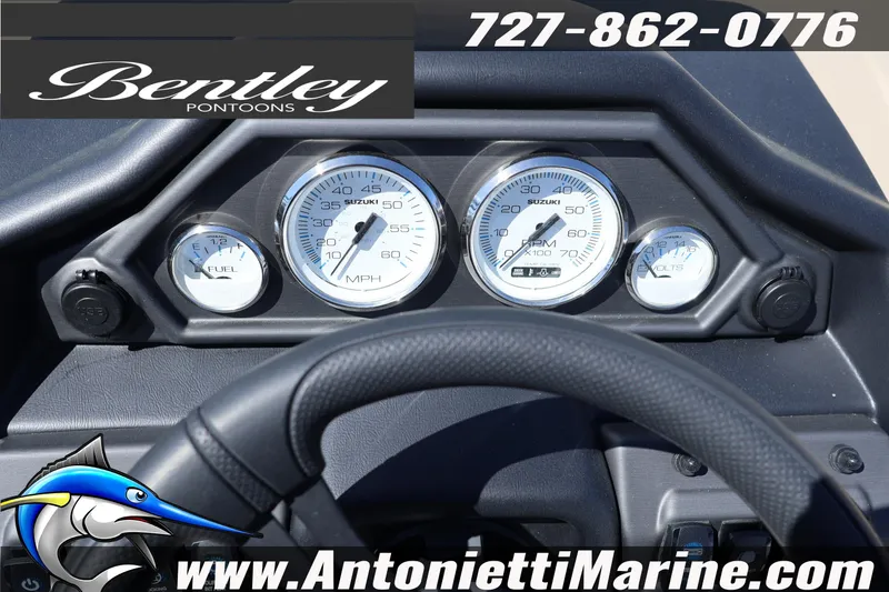 Slide: The Image of 2026 Bentley Pontoons Legacy 203 Swingback dashboard with gauges and steering wheel. - 17