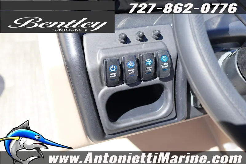 Slide: The Image of Control panel of 2026 Bentley Pontoons Legacy 203 Swingback with switches and branding. - 18
