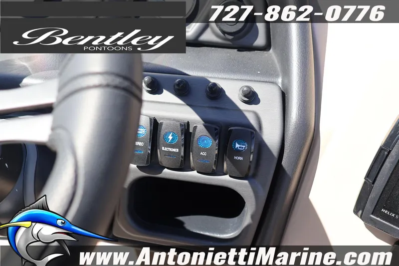 Slide: The Image of Dashboard controls of 2026 Bentley Pontoons Legacy 203 Swingback with contact information. - 19
