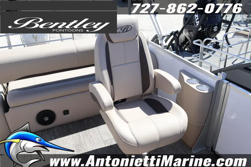 Slide: The Image of 2026 Bentley Pontoons Legacy 203 Swingback interior with plush seating and cup holders. - 24