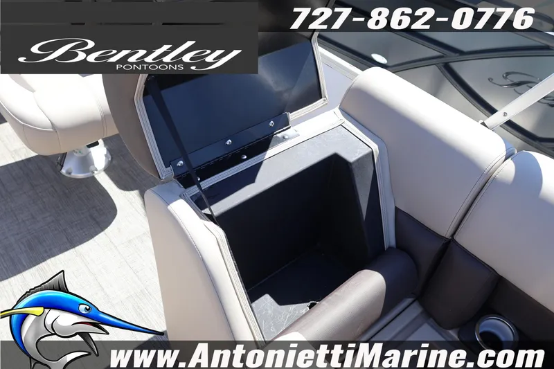 Slide: The Image of 2026 Bentley Pontoons Legacy 203 Swingback interior storage compartment, featuring luxurious seating. - 26