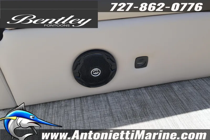 Slide: The Image of 2026 Bentley Pontoons Legacy 203 Swingback interior with speaker detail, Antonietti Marine branding. - 28