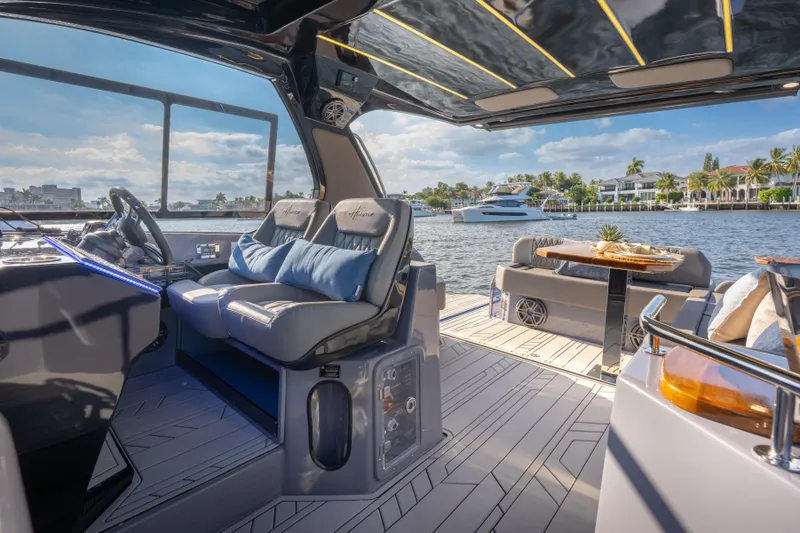 Slide: The Image of Luxurious 2026 Hanover 347 yacht interior with plush seating and scenic waterfront view. - 26