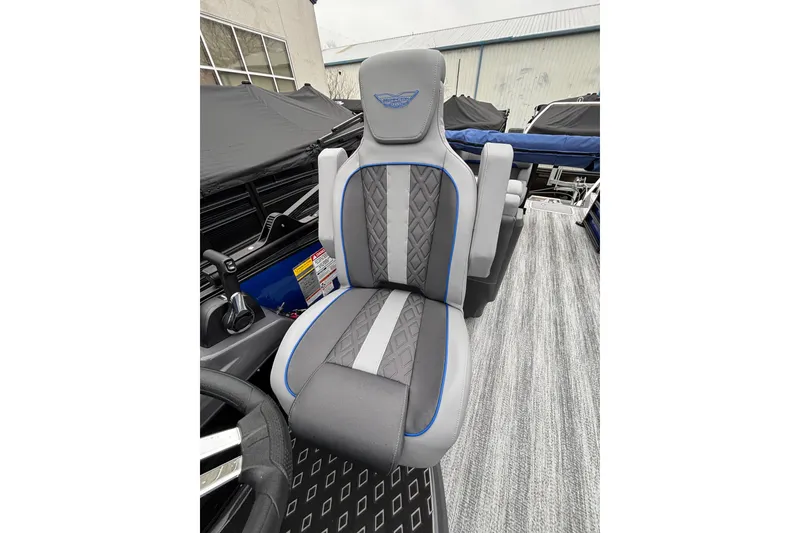 Slide: The Image of Luxury seating on 2026 Bennington 22 M FASTBACK boat, featuring gray and blue accents. - 5