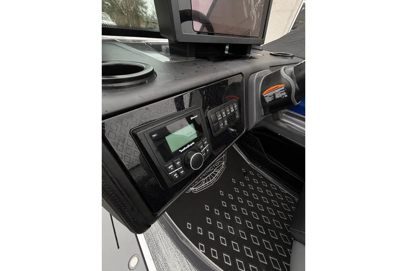 Slide: The Image of Dashboard of Bennington 22 M FASTBACK 2026 with controls and display. - 8