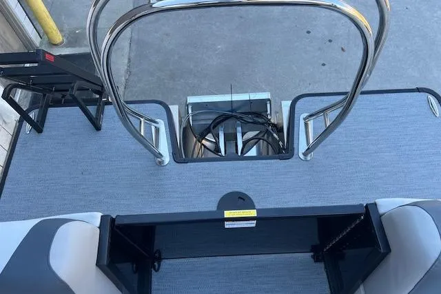 Slide: The Image of 2026 Godfrey Sweetwater 2086 SB boat deck with stainless steel railings and seating. - 12