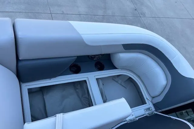 Slide: The Image of 2026 Godfrey Sweetwater 2086 SB boat interior with white and gray seating. - 18