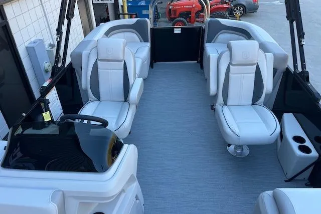 Slide: The Image of 2026 Godfrey Sweetwater 2086 SB pontoon boat interior with modern seating and steering console. - 8