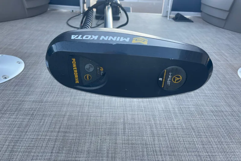 Slide: The Image of Minn Kota PowerDrive motor on 2023 Sun Tracker Fishin' Barge 20 DLX boat deck. - 9