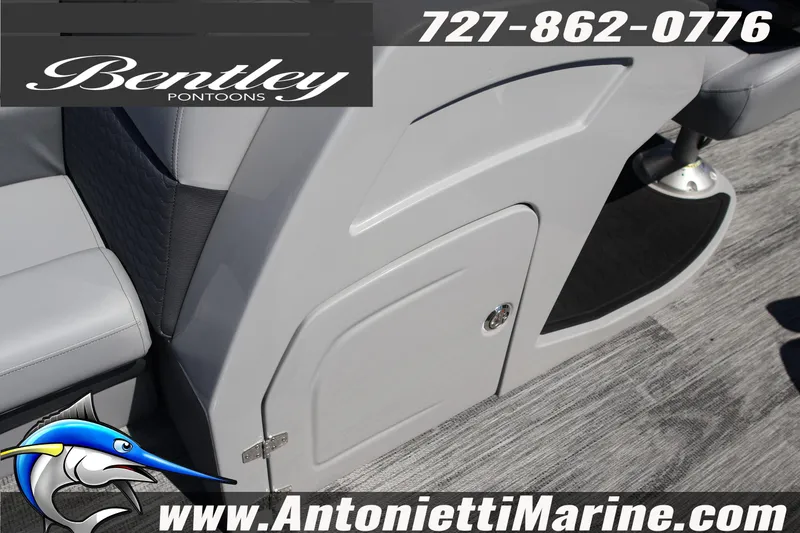 Slide: The Image of 2026 Bentley Pontoons Elite 253 Swingback interior detail with logo and contact information. - 22
