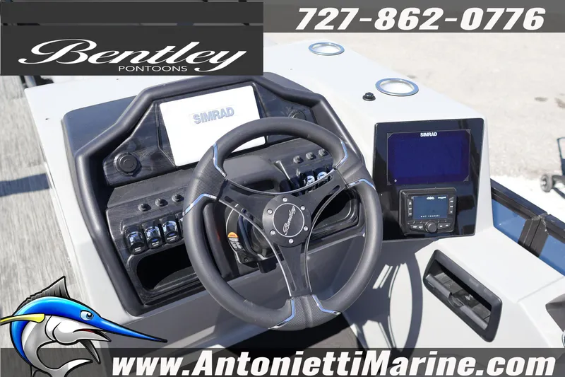 Slide: The Image of Steering console of 2026 Bentley Pontoons Elite 253 Swingback with Simrad electronics. - 24